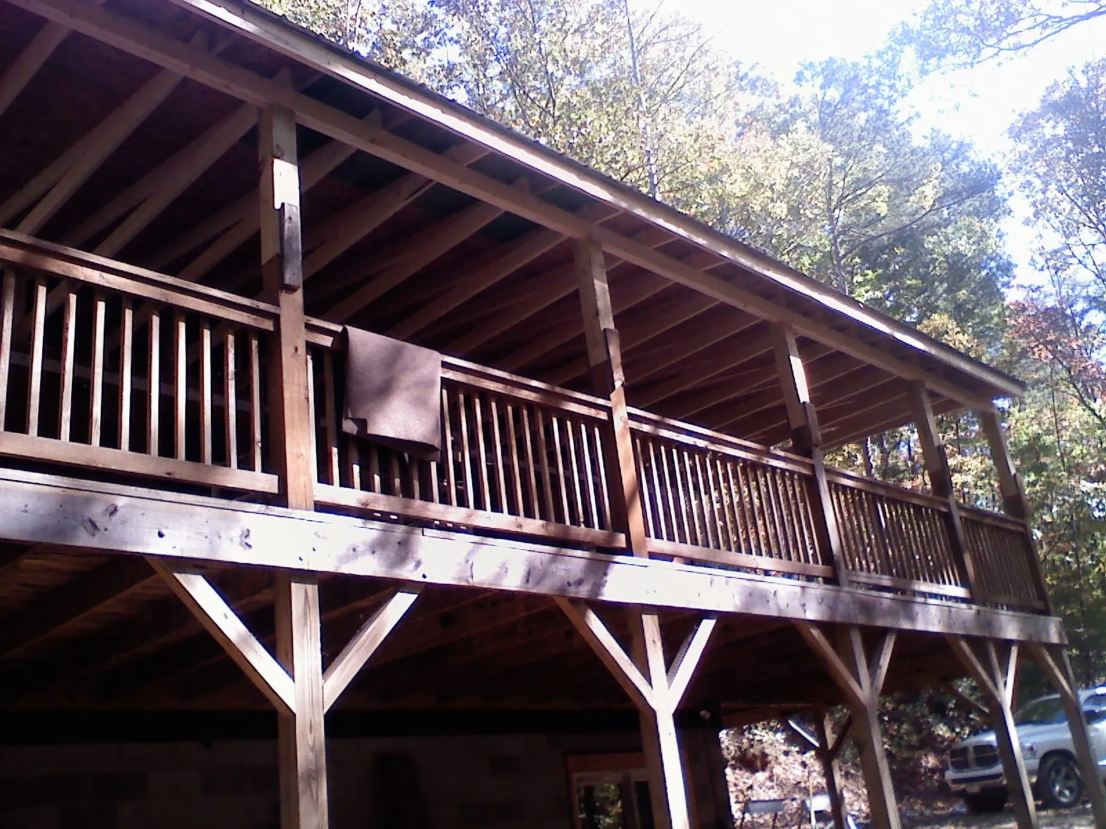 Timber framing under a new elevated porch and deck — Roof Leak Repair in Reedley by Roofing Brothers
